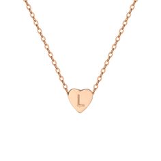 The charming Heart Initial Necklace features a heart-shaped pendant, capturing the essence of your love. Wear it to embrace a personal connection and showcase your affection in a stylish and meaningful way. Mother's Day Heart Necklace With Adjustable Initial Pendant, Adjustable Initial Pendant Necklace For Valentine's Day, Valentine's Day Necklace With Initial Pendant, Minimalist Adjustable Heart Charm Necklaces, Rose Gold Heart Necklace With Delicate Chain, Everyday Rose Gold Heart Pendant Necklace, Heart Charm Initial Pendant Necklace Gift For Her, Everyday Initial Heart Pendant Necklace For Mother's Day, Personalized Pendant Heart Necklace With Adjustable Fit