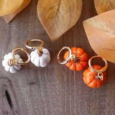 ⚘ Pumpkin Earrings - Show your love for autumn with these tiny pumpkin huggie hoops.  ⚘ Each earring in my shop is designed and handcrafted by me!  ⚘ Hypoallergenic 18k gold hardware ⚘ Lightweight polymer clay ⚘ Remove before showering or swimming ⚘ Please contact me directly with any issues regarding your order ⚘ Free Shipping on orders $35+ ⚘ Visit my shop for more cozy accessories & gifts     Thank you for visiting! ❤ https://www.instagram.com/auggie.art/  https://www.youtube.com/@auggieart Polymer Clay Thanksgiving Earrings, Thanksgiving Clay Earrings, Clay Huggie Earrings, Fall Polymer Clay Ideas, Food Polymer Clay, Autumn Earrings, Earring Inspo, Gold Pumpkins, Earrings Hypoallergenic