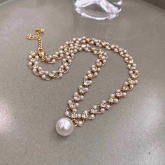 Product Specification: Pearl type: ShellPearl shape: RoundPearl color: WhitePearl Size: 8MMLength:40CM/15.7inStock Number:8038For: FemaleWeight:8g Package Includes: 1 x Hugetomato Necklace1 x Box from HugeTomato Pearl Drop Necklace, Mother Of Pearl Earrings, Baroque Pearl Earrings, Multi Strand Bracelet, Pearl And Diamond Earrings, Jade Earrings, Girl Jewelry, Pearl Types, Pearl Earrings Dangle