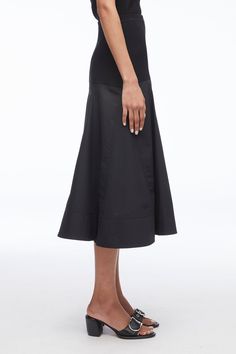 Focused, feminine and versatile is how creative director, Phillip Lim described our knitwear this season. And nowhere is that more apparent than in the viscose knit poplin midi skirt. This elegant A-line has a wide, subtle pleat and mid-calf hemline that imbues a soft femininity and makes it perfect for transitional seasons. Wear it with bare legs and a strappy sandal in late spring and summer, and with the Naomi soft bootie and tights as the weather cools. It is the perfect expression of our ro Late Spring, Perfect Pant, Boot Bag, Heeled Loafers, Women Trends, Mens Outerwear, Phillip Lim, Strappy Sandals, Model Height