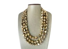 Gorgeous - perfect golden metallic statement necklace that compliments a white tee and a black dress equally! We are celebrating our favorite drinks all year long with jewelry inspired by them. These drinks have given us so many great nights, it's time we give back 😛 16 inches with a 4 inch extender chain. **All items come from a smoke and pet free home Party Jewelry In Gold-tone With Gold Beads, Chic Beaded Necklaces For Party, Party Necklaces With Faceted Metal Beads, Metal Necklaces With Faceted Beads For Parties, Chic Gold Necklaces With Round Beads, Chic Gold Jewelry With Gold Beads, Chic Gold Necklace With Round Beads, Costume Jewelry Necklaces With Polished Beads For Party, Party Necklace With Gold Beads