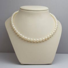 "For sale: (1) d563 14k Yellow Gold Pearl Necklace PLEASE READ ENTIRE DESCRIPTION BEFORE PURCHASING Pre-owned item. Good condition. Please see pictures for details. Sold as is, as seen on pictures. This pearl necklace is bold and beautiful. Its clasp is finely crafted. This would be a wonderful gift for a loved one. Specifics: 14k Yellow gold Pearl Width: 7 mm Length: 24 inches Total Weight: 35.5 grams Please be 100% sure of your purchase before buying, as we do not offer refunds. We are more th 16 Inch Round Elegant Pearl Necklace, Elegant 16 Inch Round Pearl Necklace, Elegant Formal Pearl Necklace 16 Inch, Classic 16 Inch Necklace For Gift, Elegant 16 Inch Pearl Necklace For Formal Occasions, Classic Single Strand Round Cut Jewelry, Classic Single Strand Necklace Gift, Classic Single Strand Jewelry, Classic Jewelry With Sterling Silver Clasp