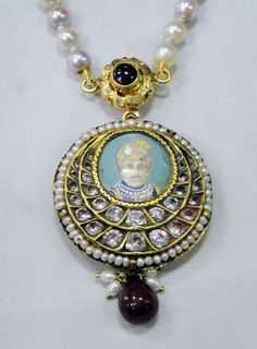 "Vintage antique 22 K solid gold and Ruby pearl Sapphire gemstone Necklace. Original old Royal piece with Maharaja (king)miniature painting inserted in very good condition. Size of pendant-3.5 cm, Length -35 cm(13.77\") end to end, free size easy to adjust the length by moving cord knot. weight-44 grams, material -22 K gold, Ruby, pearls, Sapphire." Antique Chandbali Temple Necklace As Gift, Antique Chandbali Temple Necklace For Gift, Traditional 22k Gold Round Pendant Necklaces, 22k Gold Temple Jewelry Pearl Necklace As Gift, Traditional Round Pendant Necklace With Gemstone, Traditional 22k Gold Kundan Necklace As Gift, Traditional Gemstone Round Pendant Necklace, Kundan Pendant Temple Necklace As Gift, Kundan Temple Necklace With Pendant For Gift