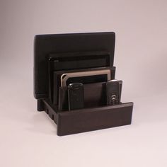 there is a cell phone and other items in the holder