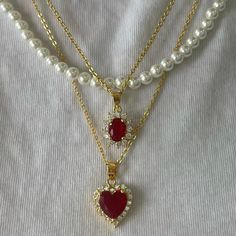 This baby is our prized possession! Get ready to match with your best friend wearing our stunning Possession necklace, available in many different colors. Gold Rings Color, Necklaces For Dresses, Love Heart Necklace, Friend Rings Matching, Gold Jewelry With Diamonds, Date Night Jewelry, Cute Heart Fashion, Pink And Red Necklace, Gold Jewelry Red Dress