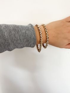 The Esmé bracelet is made from our thick chopin chain and fastened with a with lobster clasp. Material: Recycled Brass Plating: 14K Gold or Rhodium-silver Chain has a clear protective coating to prevent from quick wear and tarnishing. Chain measures: 7mm wide Clasp Measures: 15mm Available in the following Lengths: 6.5", 7", 8", 8.5", 9" Bracelet is handmade in the USA Luxury Stainless Steel Tarnish-resistant Bracelets, Luxury Gold-tone Polished Chain Bracelet, Gold-tone Stainless Steel Bracelet With Adjustable Chain, Gold-tone Metal Chain Bracelet With Lobster Clasp, Luxury Gold-tone Polished Finish Chain Bracelet, Laptop Tote Bag, Vegan Leather Bag, Anklet Bracelet, Demi Fine Jewelry