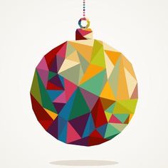 a colorful christmas ornament hanging from a string