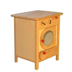 a small wooden toy oven sitting on top of a table