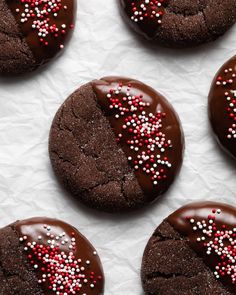 chocolate cookies with red and white sprinkles on top