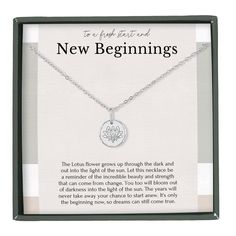 a necklace with a poem on it in a gift box that says, new beginnings