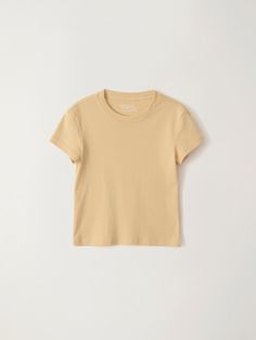 This is a minimal and modern top by NOTHING WRITTEN that is made out of high quality and sturdy material. With distinctive mood of the design and comfortable wear, you can style it for your casual daily outfit.- Minimal and classic round neckline- Cotton fabric with high elasticity- Feminine and modern mood Fitted Minimalist Everyday T-shirt, Basic Solid Crew Neck Cropped T-shirt, Basic Solid Color Cropped T-shirt, Basic Solid Cropped T-shirt With Crew Neck, Fitted Summer T-shirt In Solid Color, Solid Color Scoop Neck T-shirt With Minimal Stretch, Minimalist Crew Neck T-shirt For Summer, Classic Solid Color Everyday Top, Classic Short Sleeve Top For Everyday Spring