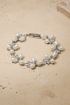 This stunning bracelets combines sparkling crystals with the luster of pearls to elevate your look and add the perfect touch of elegance. Elevate Your Look, Sparkling Crystal, Cute Packaging, Base Metal, Silver Bracelets, Bridesmaid Gifts, Sparkle, Bracelet, Crystals