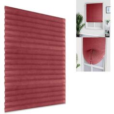 a red roller shade hanging on the side of a wall