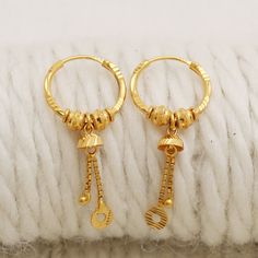 Please click -- Learn more about this item -- below for a full description 22k gold earrings handmade jewelry made in India weight is 2.37 grams approx. length is 3.4 centimeter approx. width is 1.4 centimeter approx. please message me if you want real gold screw/backs. Bali Gold Earrings, 22k Yellow Gold Dangle Earrings, 22k Yellow Gold Dangle Danglers, 22k Gold Dangle Hoop Earrings, 22k Gold Small Hoop Earrings, Small Hoop Earrings In 22k Yellow Gold, Ring Earrings Gold, Gold Bali, Small Earrings Gold