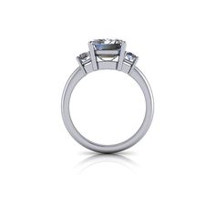 Emerald cut three stone moissanite engagement ring, perfect for engagement or anniversary3.50 ct. 10x8mm, emerald cut colorless moissanite, DEF Color, VVS Clarity.(2) 5x2.5mm, step cut baguettes, colorless moissanite, DEF Color VVS Clarity, .33 ct.*Engagement Ring Band width 2mm.*4.16 carat total weight.. *Your moissanite stone purchase will arrive with a warranty card/certificate of authenticity. *The ring is custom made just for you in your ring size and metal preference. *925 Silver is rhodiu Emerald Three Stone Ring, Engagement Ring Band, Simulated Diamond Rings, Online Registration, White Gold Set, Emerald Engagement Ring Cut, Colorless Diamond, Step Cut, Band Engagement Ring