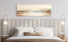 "Create a serene and elegant atmosphere in your bedroom with our Neutral Beige Watercolor Over Bed Wall Art. This enchanting artwork features a mountains and lake painting in soothing neutral beige watercolors, adding a touch of minimalist charm to your bedroom decor. Whether you choose it framed or unframed, this canvas print is ready to hang, effortlessly becoming a captivating centerpiece above your bed. Embrace the calming beauty of nature with this remarkable piece, perfect for adding a sen Over Bed Wall Art, Bed Wall Art, Earth Tone Wall Art, Panoramic Wall Art, Hanging Fixture, Canvas Frames, Bed Wall, Painting Canvas, Bright White