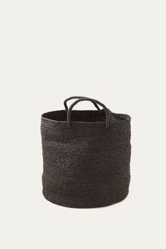 a large black basket with handles