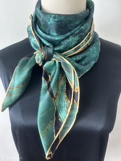 Vibrant turquoise green natural mulberry silk square scarf with size of 88 cm x 88 cm/ 35 in x 35 in. Hand-rolled golden edges with hand stitching finishing. Gorgeous, velvety turquoise print, embellished with dreamy golden-copper streaks. Soft and lustrous silk charmeuse, light weight, semi translucent, breathable and skin-friendly fabric feels very comfortable to wear. Can style in different ways: wear this scarf as a neck scarf, as a hair wrap scarf, as a head scarf, as a small shawl...Suitab Formal Green Silk Scarf, Green Silk Scarf For Formal Occasions, Green Silk Shawl Scarf, Formal Green Silk Scarves, Bohemian Green Silk Scarves, Green Silk Bohemian Scarves, Elegant Green Scarf As Gift, Elegant Green Scarves As Gifts, Green Silk Scarves For Formal Occasions