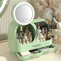 A cosmetic Organizer with Fan and 360° Rotating LED Mirror is your best choice with its high capacity, you can fit all of your favorite cosmetics in this organizer. The mirror surface is rotatable and flexible.LED makeup mirror with fan, surrounded by the breeze, to avoid sweating and make your makeup more smoothly. USB charge powered makes sure it can be used anywhere. Makeup Vanity Green, Jewelry And Makeup Organizer, Cute Bedroom Stuff, Cute Desk Mirror, Vanity Skincare Organization, Organization Ideas For Bedroom, Cute Room Things, Cute Stuff To Buy