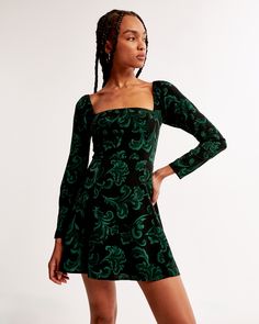 Flattering long-sleeve mini dress in our soft crepe fabric and fit & flare silhouette, with a square neckline. Giselle Dress, Christmas Dresses, Green Pattern, Long Sleeve Mini, Crepe Fabric, Christmas Dress, Long Sleeve Mini Dress, Swimwear Accessories, Festive Christmas