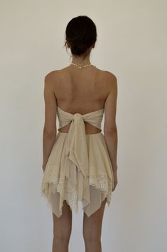 Chic Sheer Backless Dress, Chic Summer Tube Top For Prom, Strapless Lace-up Back Dress For Date Night, Spring Backless Corset Dress With Corset Back, Backless Mini Dress With Corset Back For Bridesmaids, Backless Strapless Dress For Summer Prom, Chic Beige Tie-back Dress, Chic Beige Dress With Tie Back, Chic Lace Tube Top For Summer