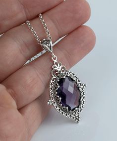 Sterling Silver Filigree Art Amethyst Gemstone Oval Pendant Necklace Silver Chain is 18.00" + 2.00" extender. Pendant height: 1.90 Inches; Pendant width: 1.05 Inches Amethyst gemstone is 13 X 18 mm double side faceted, checkboard oval cut. Oxidized and highly polished. Comes with a silver polish cloth, velvet pouch and a luxurious gift box. You can reach all our other Amethyst collection to match with your pendant, please click here Filigree is made of delicate metal strands that have been skill Bohemian Silver Teardrop Pendant Crystal Necklace, Bohemian Silver Teardrop Crystal Necklace, Nickel-free Amethyst Pendant Jewelry, Fine Jewelry Amethyst Round Pendant, Nickel Free Amethyst Round Pendant Jewelry, Amethyst Round Pendant Fine Jewelry, Nickel-free Amethyst Round Pendant Jewelry, Silver Necklace With Oval Pendant, Victorian Oval Nickel-free Necklaces