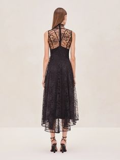 Meet the Rhiane Lace Midi Dress—a blend of elegance and edge that's designed to turn heads. This piece is all about versatility. Wear it with the slip for a more classic, refined look, or without if you're feeling daring. The intricate lace detailing adds a touch of romance, while the sheer fabric keeps things modern and unexpected. Whether you're dressing up for an event or just want to make a statement, Rhiane is your perfect go-to. Skirt Jumpsuit, Lace Midi, Cocktail Dress Lace, Sheer Fabric, Lace Midi Dress, Lace Gown, Petite Dresses, Sheer Fabrics, Jacket Tops