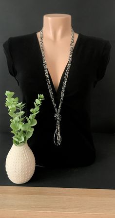 "This is a beaded long necklace that measures about 44 inches long in total in a sparkly silver color. The knot is adjustable, simple to undo and redo at the height you would like! Or you can wear the necklace double up without any knot! It is a very versatile necklace that can be adapted to your taste.   ❤ PROCESSING AND SHIPPING Most orders are made and shipped out in one business day. Please check delivery timeframes for your location on the description below.  ❤ CUSTOM ORDERS If you like thi Bohemian Beaded Necklaces For Evening, Silver Lariat Backdrop Necklace For Party, Elegant Beaded Multi-strand Crystal Necklaces, Elegant Beaded Multi-strand Crystal Necklace, Elegant Multi-strand Beaded Crystal Necklaces, Elegant Multi-strand Beaded Crystal Necklace, Silver Beaded Backdrop Necklace For Party, Elegant Beaded Chain Lariat Crystal Necklace, Bohemian Beaded Lariat Necklaces For Party