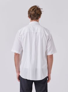 The Crepe Shirt in White is designed to be your next trans-seasonal wardrobe staple constructed from 100% Cotton crepe. Layer it up over a tee or tank for a more casual look and button it up when the formalities kick in. Classic Collar Double Chest Pockets Oversized Fit Seasonal Wardrobe, Zambia, Shirt White, Uganda, Oversized Fits, Wardrobe, Collar, White