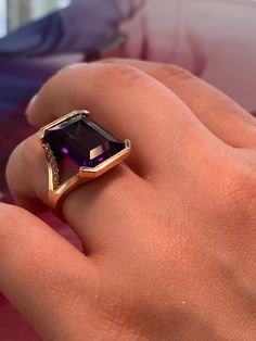 Ladies Womens Custom Luxury Handcrafted Rectangular Amethyst & Round Diamond Statement Ring 14 Karat Solid Yellow Gold Stamped Jewellery Ring Size: 6 and 1/4 US (can be adjusted to any finger size) Total Weight: 10.3 grams 24 round brilliant cut diamonds  1 Deep Purple Genuine Amethyst measuring approximately 18mm by 11mm Luxury Purple Amethyst Ring, Rectangular Shape, Luxury Purple Amethyst Rectangular Ring, Luxury Purple Rectangular Amethyst Ring, Fine Jewelry With Rectangular Gemstone Accents, Fine Jewelry With Gemstone Accents Rectangular Shape, Rectangular Amethyst Ring In Yellow Gold, Yellow Gold Amethyst Ring With Rectangular Shape, Formal Purple Amethyst Ring With Rectangular Shape, Formal Rectangular Amethyst Ring