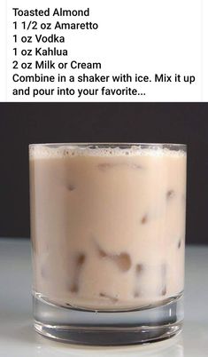 an ice cream dessert in a glass on top of a table with information about the ingredients