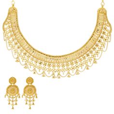 This wonderful 22k yellow gold earring and necklace set features expert beading and filigree work to create this elaborate Indian gold jewelry set. Features: • 22k yellow gold • Beading • Filigree Specifications: • Minimum Necklace Width - 1 millimeters • Maximum Necklace Width - 25 millimeters • Necklace Length - 16 to 18 inches • Minimum Earring Width - 6 millimeters • Maximum Earring Width - 21 millimeters • Earring Length - 2.25 inches • Total Weight - 62.9 grams Yellow Temple Jewelry With Intricate Design, Gold Chandbali Filigree Jewelry Sets, Yellow Filigree Jewelry For Festivals, Festive 22k Gold Jewelry Sets With Filigree, Bollywood Style Yellow Gold Filigree Jewelry, Festive 22k Gold Filigree Jewelry Sets, Yellow Temple Jewelry With Filigree, Festive Yellow Jewelry With Intricate Design, Yellow Chandbali Jewelry With Intricate Design