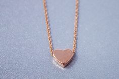 Dainty and stylish Rose gold small Heart charm necklace is great to wear for everyday or special occasions Available in rose gold SIZE ♥ Chain Length : 16.5 '' ( as pictured ) Please you can CHOOSE your chain length( 15 inches - 18 inches ) before purchasing this item ! * necklace sizes * 15 inches: around neck 16 inches: standard short 17 inches: average length 18 inches: standard long SHIPPING TIME Fast shipping within 1 - 3 days **Your order will be ready to be shipped within 3 business days Small Heart Necklace, Small Heart, Necklace Sizes, Chain Lengths, Heart Charm, Heart Necklace, Arrow Necklace, Charm Necklace, Diamond Necklace