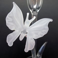 Butterfly Wedding Taper Candle Holder Glass CrystalArtist: Kevin Prochaska, glass blower at Disneyland for more than 10 years                            Material: Borosilicate Crystal and Sand Etched Borosilicate CrystalDimensions: Height 9 inches, Base Dia. 3.5 inches Weight: 6 oz. Suggested Retail: $220.00This exquisite butterfly candle holder will complete the perfect table setting. Styled to uniquely complement the design of my Butterfly Wedding Cake Topper and Toasting Glasses, this beautif Taper Candles Wedding, Butterfly Wedding Cake, Butterfly Candle, Butterfly Candle Holder, Unity Candle Holder, Shabbat Candles, Toasting Glasses, Taper Candle Holder, Candle Holders Wedding