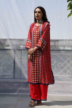 An Anti-Fit kurta set, made in pure georgette. Signature star motif and hand-embroidered central panel and sleeves. It's detailed with cobalt blue crochet edging and paired with wide crepe pants. Delivery period: 25-30 days. Anti Fit Kurta, Crepe Pants, Star Motif, Blue Crochet, Crochet Edging, Kurta Set, Cobalt Blue, Cobalt, Hand Embroidered