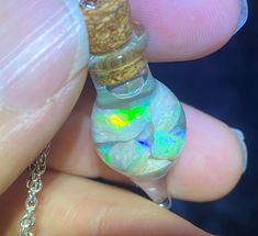 6 Cts of beautiful and colourful tiny pieces of opal are inserted into a little pendant bottle filled with water(chain length is 48cm)💦 Rough Opal, Lightning Ridge, Opal Pendants, Chain Lengths, Opal, Gems, Gift Card, Etsy Accessories, Accessory Gift