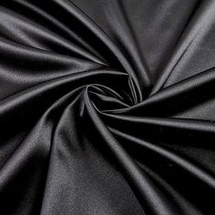 the black fabric is very soft and shiny