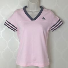 Adidas Classic Top Features V-Neck Soft Pink With Gray Trim 3-Stripe On Short Sleeves Super Soft Armpit To Armpit 17” Waist 15” Length 22” All Measurements Taken Laid Flat Nwot Never Worn! Sporty Striped V-neck Top, Pink V-neck Athleisure Top, Pink V-neck Sports Top, Spring Striped Sports Tops, Adidas Sporty V-neck Tops, Adidas Pink Sports Top, Gray Trim, Adidas Classic, Grey Trim