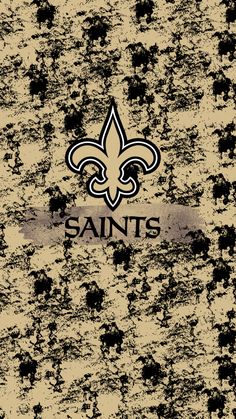 the new orleans saints logo is shown on an old, grungy wallpaper