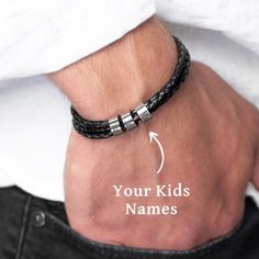 "Introducing the perfect gift for any proud dad - our personalized leather bracelet! Handcrafted with premium leather and adorned with sleek silver beads, this bracelet exudes a timeless, masculine charm. Each silver bead is intricately engraved with the names of your beloved kids, creating a heartfelt and meaningful keepsake. With its adjustable clasp, this bracelet ensures a comfortable fit for every wrist size. Showcasing the love and bond between a father and his children, this personalized Classic Leather Braided Bracelets As A Gift, Classic Leather Braided Bracelet Gift, Father's Day Silver Leather Bracelet Gift, Father's Day Gift Silver Leather Bracelet, Father's Day Silver Leather Bracelet, Customizable Name Bracelet For Father's Day, Classic Leather Bracelet For Gift, Classic Leather Bracelet With Stainless Steel Clasp Gift, Everyday Leather Jewelry With Engraving Option