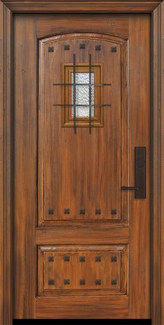 the front door is made of wood and has a glass window