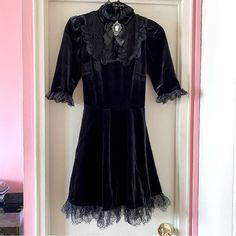 Nwt Dolls Kill Widow Ladyhawke Black Velvet Mini Dress With Lace Trim, Lace High Neck Collar And Cameo Brooch Pin. Size Medium. Never Worn. Goth, Grunge, Elegant, Sophisticated, Chic, Figure Flattering, Trendy. Black Mini Dress With Lace Trim For Costume Party, Elegant Mini Dress With Lace Trim For Costume Party, Elegant Mini Length Halloween Dress, Elegant Lace Trim Mini Dress For Costume Party, Elegant Halloween Mini Dress, Vintage Mini Dress For Costume Party, Vintage Style Mini Dress For Costume Party, Mini Length Coquette Dress For Costume Party, Elegant Mini Halloween Dress