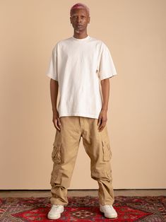 The 8 Pocket Cargo Pants, a streetwear essential. Designed with a relaxed fit throughout. These pants feature 2 pockets on each side seam, zipper fly and finished with riveting at the knee. Model is 6'0 wearing a size 32. Please see last slide for full size chart. Check out our other listings for more colors and other streetwear styles. For news and product updates give us a follow on instagram at brandonthorne.us. Streetwear Pants With Double-needle Straight Hem, Urban Cotton Cargo Pants, Urban Cargo Pants For Adventures, Straight Leg Boxy Fit Pants With Pockets, Hip Hop Straight Leg Cargo Bottoms, Hip Hop Cargo Style Straight Leg Bottoms, Urban Pants With Pockets And Straight Hem, Casual Cargo Pants With Relaxed Fit And Straight Hem, Casual Relaxed Fit Cargo Pants With Straight Hem