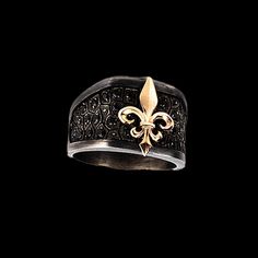 Fleur De Lis Ring, 925k Sterling Silver, men's jewelry BLACK Collection A special collection dominated by black, using the power and magic of black and bringing it together with the shine of precious stones and gold. Complementing the nobility and power with a modern elegance, the KANO BLACK collection, reflecting today's trends, interprets the traces of centuries ago and transforms them into magnificent designs. Luxury Oxidized Finish Rings For Anniversary, Luxury Black Engraved Ring In Sterling Silver, Luxury Black Engraved Ring With Polished Finish, Luxury Black Sterling Silver Ring, Black Oxidized Rings For Anniversary, Luxury Black Engraved Ring For Anniversary, Classic Black Rings With Oxidized Finish, Luxury Black Jewelry With Oxidized Finish, Luxury Black Oxidized Jewelry