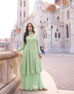 Mint green flared top with palazzo and dupatta Anarkali Style Floor-length Pista Green Palazzo Set, Traditional Green Floor-length Palazzo Set, Festive Green Palazzo Set With Dupatta, Green Floor-length Designer Wear Sets, Traditional Green Palazzo Set With Dabka, Green Palazzo Set With Dabka For Eid, Traditional Green Palazzo Set With Dabka Details, Green Palazzo Set With Dupatta, Designer Green Palazzo Set With Dupatta