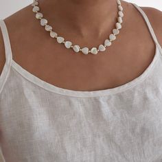 This heart necklace is made from shell with gold bead accents. It's a must have necklace for the summer, perfect for those summer vacations, it elevates any outfit and is also deal for layering. We make our jewellery in small batches to reduce wastage. Our jewellery is designed with the modern Woman in mind, elegant, unique pieces with a classic touch. Our jewellery is great for gifting, whether it's Valentines, Mothers Day, Birthday or simply a gift for a friend, sister etc. Material- 18ct gold Jewellery Layering, Gold Shell Necklace, Beaded Boho Jewelry, Heart Necklace Gold, Beach Necklace, Jewelry Holiday, Beach Necklaces, Summer Vacations, Gold Heart Necklace