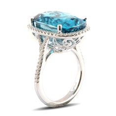 The glamorous blue that radiates from this 26.88 carat natural Zircon is unmatched in beauty. A rare find in this color and size, the gems incredibly clear internal appearance adds to its luster and shimmering sparkle. Detailed Ring, Zircon Ring, Blue Zircon, 14k White Gold Ring, White Gold Ring, Diamond Sizes, Sparkle Diamonds, White Gold Rings, Gold Ring