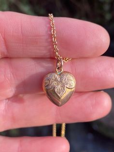 ~ Here we have a beautiful antique ornate gold heart pendant  ~ Measures 20.75mm north to south approximately including bail. Heart itself 14.2mm north to south approximately.  ~ In excellent condition, light wear in keeping with age and use, no damage to report, a little solder work can be seen where bale attaches .   ~ Stamped to reverse for 9ct gold ~ Chain shown for scale and styling purposes only, not included in sale, price is pendant only, chain available separately  ~ Any questions or fo Vintage Antique Gold Heart Pendant Necklace, Antique Gold Heart Pendant Vintage Necklace, Vintage Gold Heart Charm Necklace, Vintage Gold Heart Pendant Necklace, Yellow Gold Heart Necklace With Vintage Charm, Vintage Double Heart Engraved Necklace, Vintage Engraved Double Heart Necklace, Antique Heart-shaped Yellow Gold Jewelry, Antique Gold Heart Necklace With Vintage Charm