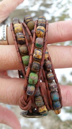 Indian Head Rustic Triple Wrap Bracelet by offbeadinpathneosho Artisan Hand Wrapped Wrap Bracelet With Round Beads, Artisan Wrap Bracelet With Round Beads For Festivals, Adjustable Earthy Hand Wrapped Bracelet, Earthy Adjustable Hand Wrapped Bracelet, Artisan Wrap Bracelet With Round Beads, Handmade Leather Wrap Bracelet For Festivals, Artisan Handmade Wrap Bracelet With Round Beads, Unique Hand Wrapped Healing Wrap Bracelet, Bohemian Brown Wire Wrapped Beaded Bracelets