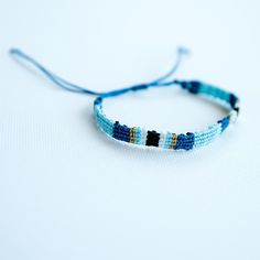 Introducing our versatile and stylish unisex braided bracelet – an everyday essential that adds a touch of charm to any outfit. Whether you're strolling along the beach, soaking up the summer sun, or just adding a casual flair to your daily look, this bracelet is the perfect choice. 🌟 Minimalist Design: Crafted with a minimalist aesthetic, this woven bracelet is designed to complement a variety of styles, making it an ideal accessory for both men and women. 🌊 Beachy Vibes: Embrace the carefree spirit of summer with this fun beach jewelry. The braided design brings to mind memories of sandy shores and the soothing rhythm of ocean waves. 👫 Symbol of Friendship: A timeless symbol of connection and friendship, this friendship bracelet is a wonderful gift for a friend, loved one, or even you Casual Braided Bracelets With Adjustable Length, Trendy Adjustable Beaded Braided Bracelets, Casual Braided Bracelet With Adjustable Cord, Casual Everyday Braided Bracelet With Adjustable Cord, Adjustable Beaded Braided Bracelets For Everyday, Casual Braided Bracelet Jewelry, Casual Braided Bracelet, Trendy Beaded Bracelets With Sliding Knot For Friendship, Casual Beaded Adjustable Friendship Bracelets